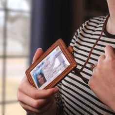 Description Clear id badge holder shows off your ID while the unique baseball glove leather pocket holds extra business or credit cards. The timeless design of premium steer hide leather accented with a vintage glove leather pocket ensures that this lanyard ID holder badge sleeve will only get better with age. Each work badge holder is packaged in a bonus FC Goods patched linen bag to make the perfect gift for teachers, doctors, government employees, and military men. Preserve the enduring legac Lanyard Id Holder, Leather Lanyard, Work Badge, Vintage Gloves, 2023 Vision, Leather Pocket, Baseball Glove, Military Men, Id Badge Holders