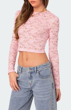 Primed for date night, this romantic top is crafted in a cropped silhouette from rich floral lace. Jewel neck Long sleeves 95% polyester, 5% spandex Machine wash, dry flat Imported Pink Lace Shirt, Romantic Tops, Pink Lace Tops, Fishnet Top, Sheer Lace Top, Lace Crop Tops, Red Fashion, Sheer Lace, Lace Fabric