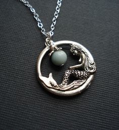 Mermaid Necklace In Silver. Mermaid Pendant by AnechkasJewelry Silver Pewter Jewelry, Silver Pewter Round Jewelry, Nickel Free Round Pewter Jewelry, Ocean-inspired Silver Necklaces With Charms, Nickel Free Ocean-inspired Necklace With Round Pendant, Ocean-inspired Nickel-free Necklace With Round Pendant, Nickel-free Ocean-inspired Round Pendant Necklaces, Nickel-free Ocean-inspired Round Pendant Necklace, Nickel-free Ocean-inspired Round Pendant Jewelry