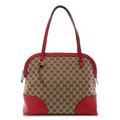 This is an authentic GUCCI Monogram Medium Bree Shoulder Bag in Red. This stylish tote is finely crafted of brown on beige Gucci GG monogram canvas. The tote features thin and sturdy red leather strap top handles with a leather trim at the sides as well along the base and the top rim. The top unzips to a natural fabric interior with both zipper and patch pockets. Small Messenger Bag, Gg Monogram, Gucci Monogram, Vintage Monogram, Gucci Shoulder Bag, Natural Fabric, Black Phone Case, Strap Top, Strap Tops