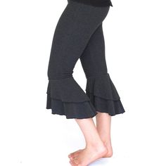 Sassy yoga dance pants with ruffles for your movement pleasure!There are two lovely ruffles at the bottom.  These work great in all seasons, in summer with sandals and in winter with boots.  They also layer well with skirts or dresses on top.  Smooth non-binding elastic waist.  Awesomely comfortable fit.XS=size 0-4, S=size 4-6, M=size 6-8, L=size 8-10, XL=size 12-14, XXL=size 16-18XS - hips from 34"-36”, waist 24”-26” S - hips 36"-38", waist 25”-27”M - hips 38"-40", waist 28”-30” L - hips 40"-42 Dance Pants, Yoga Dance, Women Fashion Edgy, Festival Clothing, Over 50 Womens Fashion, Womens Capris, Jeans Diy, Leggings For Women, Fashion Tips For Women