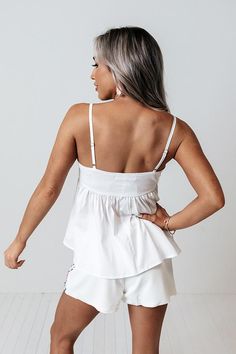 Our adorable white 'Lovely Story' tank is the upgrade your wardrobe has been asking for with its lightweight material, square neckline with adjustable spaghetti straps, and flattering figure hugging bodice that falls into a flirty babydoll silhouette with a straight hemline!