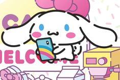 an image of a hello kitty holding a cell phone