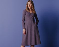 Simple but elegant wool office dress. The mysterious purple color makes this women's dress more noticeable. Made of perfect thin wool which makes it look light and feminine! Features of the model:  * made from quality thin wool * rayon lining * fitted silhouette * fit&flare skirt (65 cm from the waist) * long sleeve (57 cm) * V-neckline * pockets  * zipper on the back THIS DRESS IS ALSO AVAILABLE IN OTHER FABRICS:  https://www.etsy.com/listing/556929167/wool-brown-dress-office-dress-business?click_key=3e59d7a711e0c6a37ad964f9c6096b4e811f6498%3A556929167&click_sum=b727189b&ref=shop_home_active_58&pro=1&frs=1 IMPORTANT NOTICE: Please agree with us your size before making an order. MEASUREMENT CHART: 6 (USA) / 36(EU) / 42 (UA) - 33"/26"/35" 8 (USA) / 38(EU) / 44 (UA) - 34,5"/28"/36,5" 10 (USA Midi Dress Wedding, Feminine Features, Dress Business, Dress Office, Fit And Flare Skirt, Business Dress, Office Dress, Office Dresses, Dress Midi