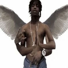 a man with wings on his chest holding a cell phone