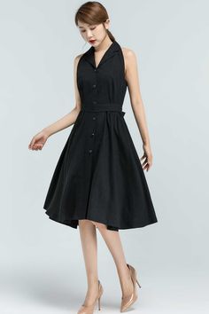 "Elegant and simple design, our black linen dress continue to shows a easy-going attitude of life. The sleeveless summer dress is made of soft linen fabric, with knee length, button down and a tie on the waist. It is a summer handmade dress, is perfect for everyday or special occasion. DETAILS * 50% linen , 50% cotton * No lining * Shirt collar * Sleeveless * Two side seam pockets * Button front closure * Fit and flare dress * Knee Length dress * perfect for Summer * Wash by hand or machine with Black Linen Dress, Collared Shirt Dress, Shirtwaist Dress, Cotton Linen Dresses, Wool Clothing, Handmade Dress, Spring Skirts, Button Front Dress, Sleeveless Dress Summer