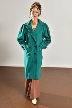 80's Wool Dress Coat/ 80's Wool Overcaot/ Vintage 100% Wool Coat/ Aqua Marine/ Fashions by Jill Jr/ Size SJust an impeccable coat made by Jill Jr.In perfect condition inside and out. 100% Worumbo Wool!The color is really exquisite, a sea green, that depending upon the light moves more blue than green! Black lining.Quintessential 80's batwing!The dropped sash in the back is a nod to the 20's. It's such a great look.Pair it with flares or skinny jeans, it will give everything a style boost!There i Vintage Green Double-breasted Outerwear, Vintage Green Long Coat, Retro Oversized Outerwear For Work, Wool Dress Coat, Wool Overcoat, 80s Dress, Dress Coat, Leather Trench Coat, Aqua Marine