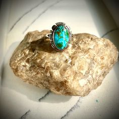 Absolutely Stunning Statement Ring Recently Acquired From The Sandia Pueblo In Albuquerque New Mexico, Handcrafted By A Navajo Silversmith/Artisan. Includes Stamped Artists’ Makers Mark - Jf As Well As Sterling Designation Turquoise Stone Is A Sought After Blue With Touches Of Jade Green Within Matrix Webbing. Classic, Eye-Catching, And Superbly Crafted Ring That Is One Of A Kind! Turquoise Is Sacred To The Navajo Tribe, As It Is Considered To Have Mystical, Protective Qualities - Therefore Genuine Navajo Jewelry S Crafted With The Utmost Care And Precision. Stone Measures At Approx. 0.4”X0.7” Size 10.5 Navajo Rings Turquoise, Vintage Multi-stone Turquoise Ring Gift, Vintage Navajo Jewelry Stone, Blue Multi-stone Turquoise Ring In Sterling Silver, Southwestern Turquoise Nickel-free Jewelry, Navajo Turquoise, Navajo Jewelry, Turquoise Stone, Sterling Ring