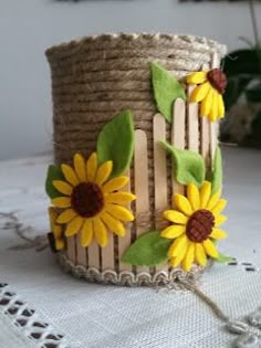 a close up of a bracelet with sunflowers on it