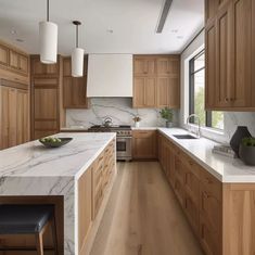 a large kitchen with marble counter tops and wooden cabinets, along with an island in the middle