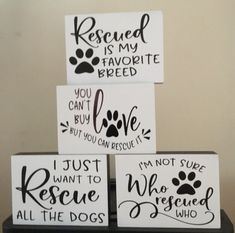 three wooden signs that say rescue is my favorite breed and i just want to rescue all the dogs