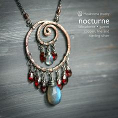 This chandelier style necklace features faceted array of labradorites and garnets arranged on a textured copper spiral hoop.  It comes with a 19 in rolo chain and is finished with spring ring clasp and 3 in extension. You will receive the necklace pictured. READY TO SHIP DIMENSIONS: Chain: 19-22 in Labradorite: 8-18mm Garnet: 4-8mm Please enter my main store at: ★ http://www.etsy.com/shop/mayahelena ★ Thanks for looking! Elastic Necklace, Copper Necklaces, Wire Wrapped Stone Jewelry, Wire Wrap Jewelry Designs, Wire Wrapped Jewelry Diy, Metalwork Jewelry, Wire Wrapping Stones, Crystal Necklaces, Diy Wire Jewelry