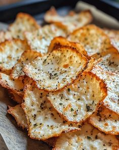 crispy potato chips with seasoning on top