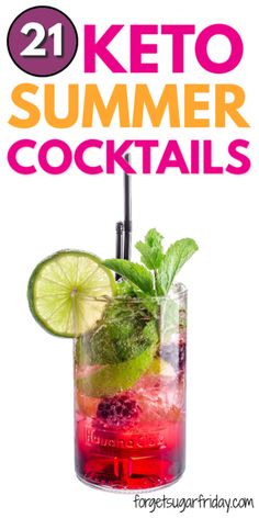 a tall glass filled with drinks and garnished with limes, raspberries, and mint