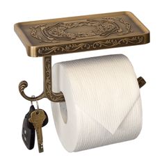 a toilet paper holder with two rolls of toilet paper hanging from it's side