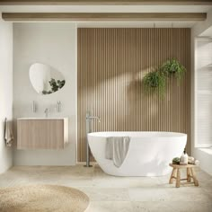 a white bath tub sitting next to a wooden wall