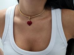 ▪ A Dainty chain choker decorated with a sterling silver 925 Heart pendant with dark Red enamel coating, The chain is made of brass plated Gold 2 microns.    The choker is full of chic and style and is suitable for any occasion.   . ▪ Red heart Collar, Heart Necklace, Red heart pendant necklace, Gold Choker Necklace, Gold Snake Chain, Day Collar For Wife, Gift For Mom      Please note, ▪ Micron coating has a one-year warranty on the coating. ▪ Besides the length of the chain, there is another 2. Red Heart Pendant Necklace, Heart Necklace Red, Red Heart Pendant, Heart Pendant Necklace Gold, Dainty Choker Necklace, Choker Necklace Gold, Day Collar, Gold Snake Chain, Heart Choker Necklace