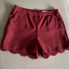 Scalloped Edges And Pockets High Waist Fit Size M Never Worn, Great Condition 98% Polyester, 2% Spandex Perfect For Gameday! They Appear More Red In Picture But Actually Closer To A Dark Maroon Color In Person Stretch Red Bottoms For Day Out, Chic Stretch Red Shorts, Chic Red Stretch Shorts, Trendy Burgundy Bottoms For Summer, Stretch Red Shorts With Pockets, Red Stretch Shorts With Pockets, Red High Waist Shorts For Day Out, Red Spring Shorts, Red Spring Short Pants