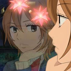 an anime character with long hair and stars on her head looking at another character's face