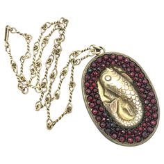 The pendant is set with three rows of graduated facetted garnets in various sizes. within anondulated frame. The length of the handmade chain without the pendant meassures 26 cm, the pendant 7.1 cm. The pendant comes in its original unpolished condition, can however be polished if so wished, Handmade Chain, Antique Art, Garnet, Jewelry Necklace Pendant, Arts And Crafts, Jewelry Necklaces, Pendant Necklace, Chain, The Originals