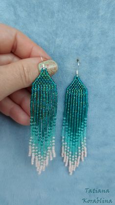 These handmade earrings are made of high-quality Czech beads and strong synthetic thread. They are elegant, fashionable, and highly versatile, suitable for everyday wear. Color: green,mint ,herbal. There may be some color discrepancies which is due to the different monitor settings 100% hand made with love! Measurements: Length-about 11cm (4.33 inch) Width -about 2 cm (0.79 inch) Materials: Sterling silver components Czech glass beads Strong bead weaving thread Dark Green Earrings, Chandelier Boho, Earrings Chandelier, Green Mint, Abstract Floral Print, Green Earrings, Earrings Long, Seed Bead Earrings, Czech Beads