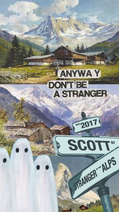 there are two signs with ghost faces in front of the mountain and another sign that says, anyway don't be a stranger