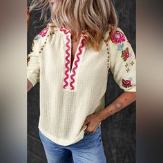 Beige Floral Embroidered Ricrac Puff Sleeve Textured Blouse Bohemian Top This Puff Sleeve Blouse Is Charming And Stylish For Women Intricate Floral Embroidery For A Touch Of Elegance Chic Ricrac Detailing Adds A Playful Twist Textured Fabric Elevates The Overall Design Brand New In Packaging Casual White Blouse With Boho Collar, Casual Embroidered Top With Boho Collar For Spring, Red Bohemian Embroidered V-neck Top, White Folk Style V-neck Blouse, Summer Embroidered Beige Blouse, Embroidered Beige Blouse For Summer, White Spring Blouse With Boho Collar, White Boho Collar Blouse For Spring, White Blouse With Boho Collar For Spring