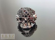 925 Sterling Silver Skull Ring Black&Red Cubic Zirconia Iced Eye Stripes Skull Pirate Punk Goth Biker Rocker Exclusive Design ✓ Unique & Cool Design. ✓ Free Shipping. Punk Skull Ring For Streetwear, Black Gothic Skull Ring For Streetwear, Black Punk Skull Ring For Streetwear, Black Skull Ring For Streetwear, Black Skull Ring For Streetwear, Punk Style, Punk Skull Ring For Biker Events, Black Gothic Skull Ring For Biker Events, Black Skull Ring For Halloween Streetwear, Black Punk Skull Ring For Biker Events