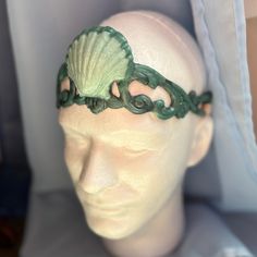 This beautiful circlet was created to match the Ailea Finbella tail by Finfolk Productions and Merbella studios . Aquarium safe, Stretchy, comfy, waterproof, and so cute! Now with black or tan bands available by request. Made from dragon skin silicone, water tested, and skin safe. Back Strap can be worn under or over hair. Be your own little mermaid! Tail not included. Merbella Mermaid Tails, Whimsical Adjustable Costume Headpiece, Handmade Adjustable Costume Headpiece, Handmade Adjustable Headpiece For Costume, Adjustable Fantasy Headband For Costumes, Adjustable Handmade Headpieces For Costume, Whimsical Adjustable Headband For Festivals, Handmade Adjustable Headband For Costume, Bohemian Adjustable Costume Headpieces