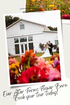 a couple standing next to each other in front of a white building with flowers on it