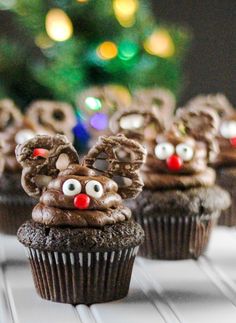 chocolate cupcakes decorated with reindeer faces and noses