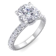 a diamond engagement ring on a white background