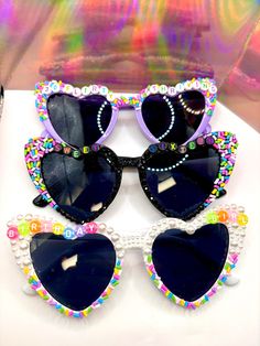 BEDAZZLED Heart Sunglasses 3D Multi-Colored Heart Beads TOTALLY CUSTOMIZABLE Please include color of glasses, letters, phrase, and date needed by. Cheer Squad Gifts Heart Glasses, Playful Multicolor Party Sunglasses, Bedazzled Sunglasses Diy, Multicolor Plastic Sunglasses For Birthday, Decorate Sunglasses, Birthday Glasses, Funky Glasses, Resin Jewelry Making, Pinterest Ideas