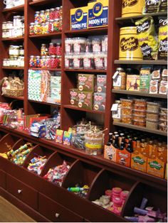 a store filled with lots of different types of food and condiments on shelves