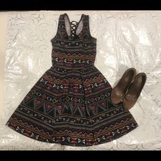 Jessica Simpson Skater Aztec Design Dress Is Nwot And Has Never Been Worn And Is In Excellent Condition. The Dress Fits Nicely To Your Body And Has A Flare Design With Lace Up Ties On The Back. Price On The Dress Is Less Than Half The Cost Of The Dress Paid. (1054) Casual Patterned Mini Dress For Party, Casual Stretch Dresses With Patterned Color, Casual Fitted Patterned Mini Dress, Casual Stretch Patterned Dresses, Casual Patterned Fitted Dress, Casual Fitted Patterned Dress, Casual Patterned Mini Dress For Fall, Aztec Design, Aztec Designs