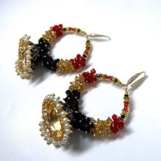 Elegant Beaded Danglers For Party, Traditional Crystal Earrings For Party, Elegant Beaded Earrings For Party And Festivals, Elegant Beaded Danglers For Celebration, Black Round Earrings For Wedding, Black Bollywood Style Jewelry For Wedding, Black Bollywood Jewelry For Wedding, Bollywood Style Black Jewelry For Wedding, Traditional Black Dangle Jhumkas