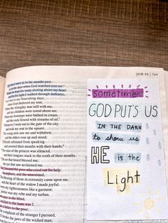 an open bible with some words on it and the word god puts us in the dark