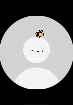 a white circle with a yellow bee on it