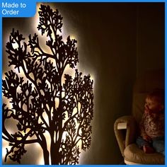 This stunning tree wall art is a beautiful addition to a wall, or shelf to create the cosiest atmosphere. This design was originally bespoke for a little toddler's room and is used as a nightlight!  We offer two sizes currently: Large (1.2m tall, 0.9m wide) Small (0.36m tall, 0.28m wide) Created from 5mm hardwood ply and comes with a remote for the large tree.  Large is either battery USB or battery LED operated Small is battery LED operated  Please note: there is a 9mm offstand Diy Inspirational Wall Art, Art With Led Lights, Led Wall Decor, Led Wall Art, Wall Decor Nursery, Large Tree, Wooden Wall Decor, Lights Led, Tree Wall Art