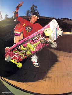 a man flying through the air while riding a skateboard on top of a ramp