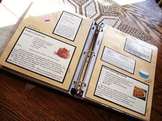 an open book on a wooden table with papers attached to the pages and instructions for making pizza