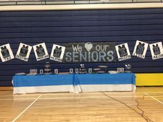 the table is set up with pictures on it for seniors to enjoy their time together