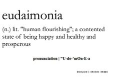 the words eudiamonia are written in black and white, with an image of a