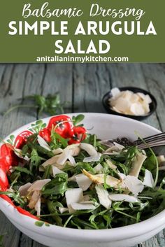 a white bowl filled with salad and topped with cheese