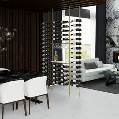 a living room filled with furniture and a wine rack