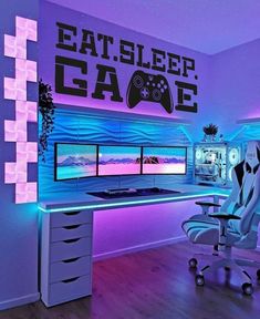 a room with a desk, chair and computer monitor on the wall that says eat sleep game