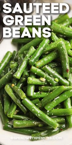 sauteed green beans on a white plate