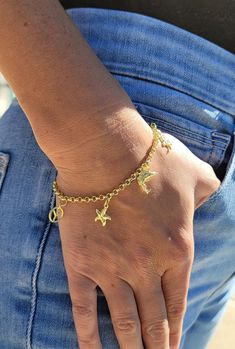 14K Yellow Gold Assorted Charm Bracelet Bracelet can be made available in 7" or 8" Estimated Delivery: 1-2 weeks Charms Bracelet, Gold Charm Bracelet, Jewelry Inspo, Gold Charm, Bracelet Sizes, Delicate Bracelet, Bangle Bracelets, Jewelry Collection, Bangles