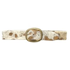 The Kia belt is designed with bronze and white calf hair leather detailed with a light gold oval buckle. 2" Sourced in Italy Ethically Made in the USA Rococo Sand, Handmade Leather Belt, Bodysuit Blouse, Jumpsuit Shorts Rompers, Calf Hair, Handbag Shoes, Leather Belts, White Hair, Shirt Accessories