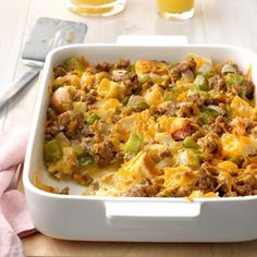 a casserole dish with meat and vegetables in it